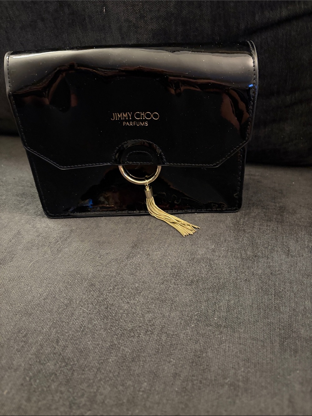 Jimmy Choo Black Patent Leather Clutch with Gold Tassel